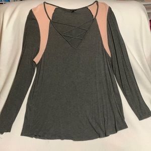 Torrid long sleeve gray tee shirt with pink accents on the shoulders.
